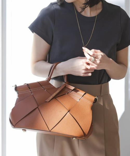 mica della valle Romana レザーメッシュバッグ
